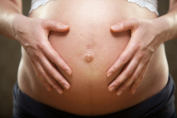 Schwangere mit Babybauch  / Pregnant Woman with her baby belly