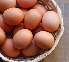 Organic eggs in basket for healthy recipes.