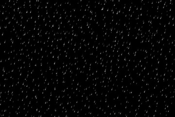 Rain fall concept. Falling raindrops on black background. Just change blending mode to 