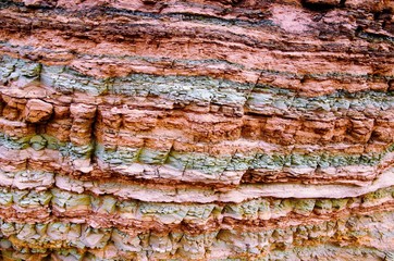 Impressions of the Canyon Quebrada de las Conchas with walls of rock displaying a multitude of red hues close to Cafayate in Chile, South America
