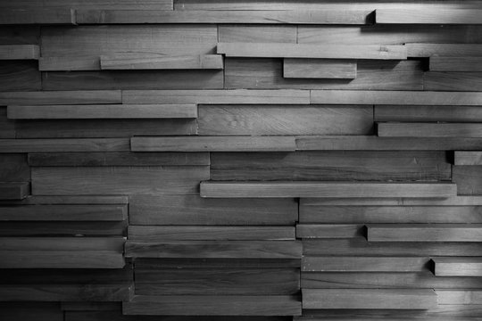Random pattern, layer and size of wood wall in black and white shot.