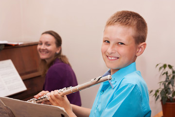Boy playing the flute