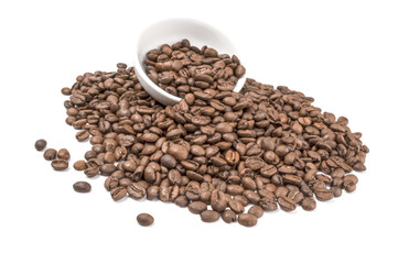 Pile of roasted coffee beans isolated on a white background cutout