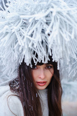 Attractive young woman in wintertime outdoor