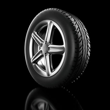 car tire on a black background - 3d rendering