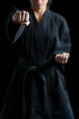 Female karate player performing karate stance