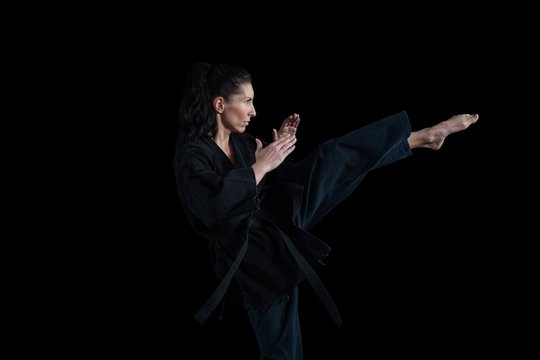 Female karate player performing karate stance