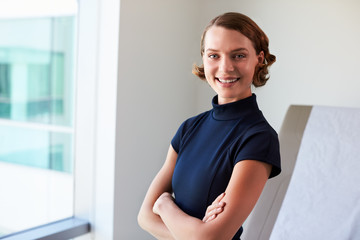 Portrait Of Female Doctor In Exam Room