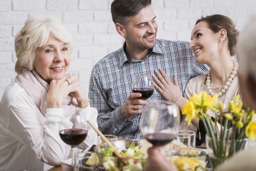 Couple celebrating anniversary with parents