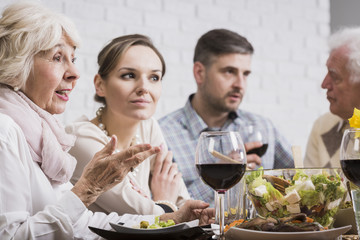 People gossiping during sunday dinner