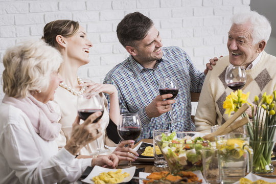 Laughing Family During Dinner