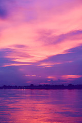 Naklejka na ściany i meble Purple Sunset Blazing Over the Mekong River in Nong Khai, Thailand