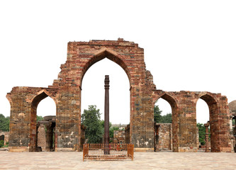 Iron Pillar and arches with intricate design in Qutub Minar Complex