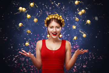 New Year, christmas, holidays concept - smiling woman in dress with gift box over lights background. 2017