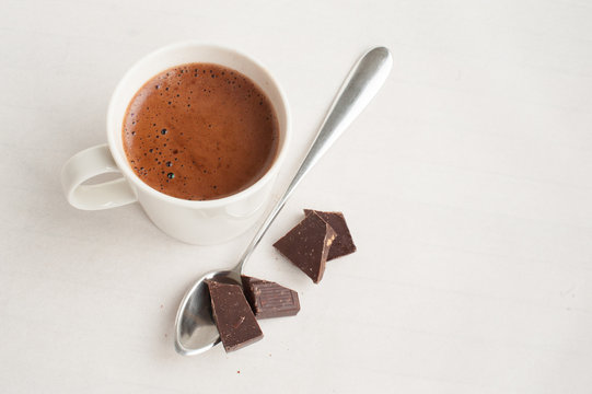 Hot Chocolate with spoon and chunks of chocolate