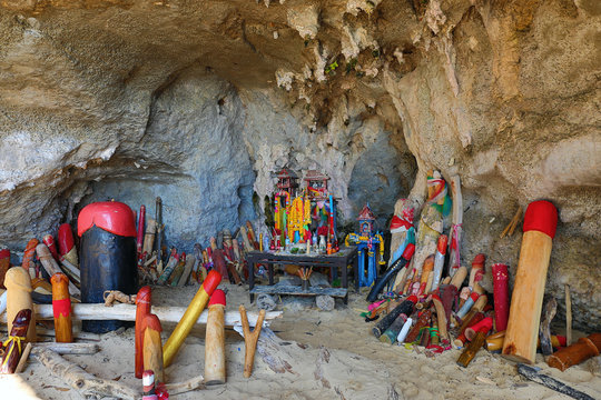 Wooden phalluses in Pranang cave, Thailand
