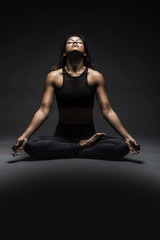 Beautiful Indian woman in yoga pose 