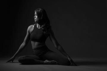 Beautiful Indian woman in yoga pose 