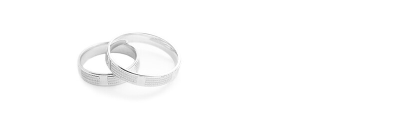 Wedding rings on wedding card on a white background, border design panoramic banner
