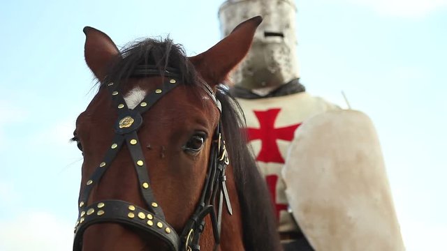 Medieval knights on horseback.