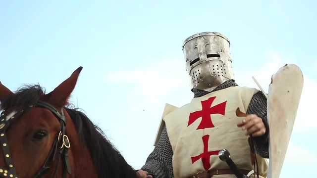 Medieval knights on horseback.
