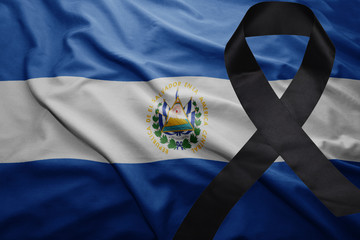 flag of el salvador with black mourning ribbon © luzitanija