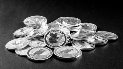 Black table with silver coins
