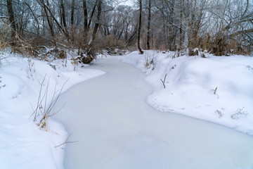 Fototapeta na wymiar Winter landscape with frozen river