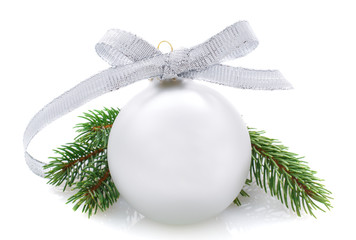 silver Christmas ball and fir branches isolated on white