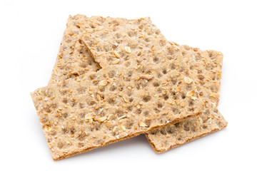 Stack of wholegrain crispy bread with sunflower, chia and sesame