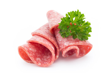 Salami sausage slices isolated on white background.
