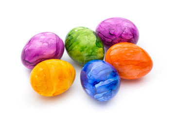 Easter eggs painted in colors on a white background.