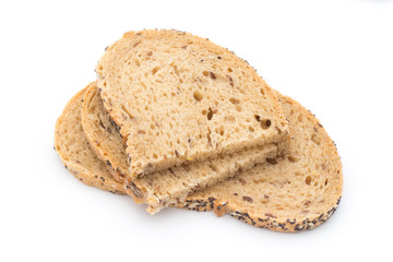 White bread sliced wholegrain bread on a wooden table.
