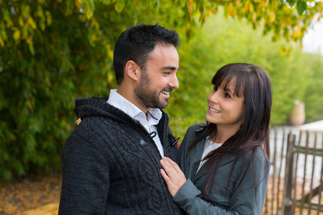 hispanic couple dating in autumn