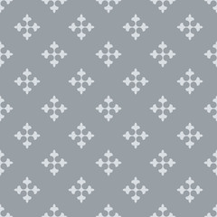 Seamless fleur de lis crosses grey vector background. © tuulijumala
