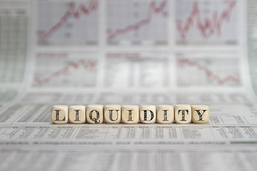 Liquidity word on business newspaper