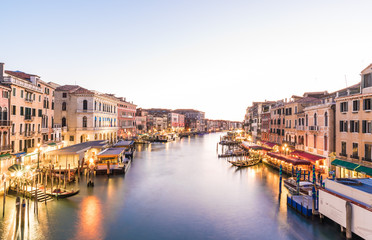 Venice (Italy) - The city on the sea. Here the cityscape with Gran Canal in the dusk, from Rialto bridge