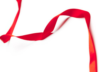 Red ribbon on white background