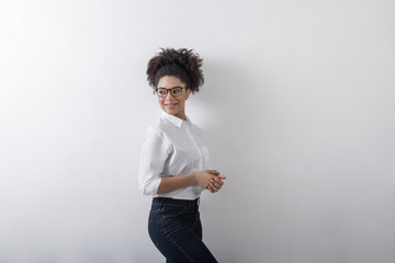 Portrait of millennial businesswoman, smiling