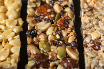 different granola bars on a slate plate