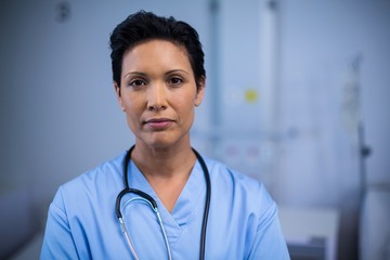 Portrait of female nurse in ward