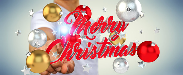 Businessman touching floating christmas message with his finger