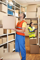 Business people working at warehouse