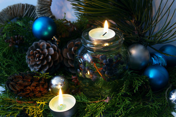 Home comfort at Christmas - candles and holiday decorations