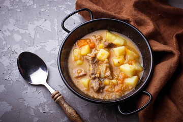 Stewed beef with potatoes, carrot and pumpkin