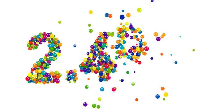 Multicolored candy sweets arranged in shape of 2.4 percent on white background