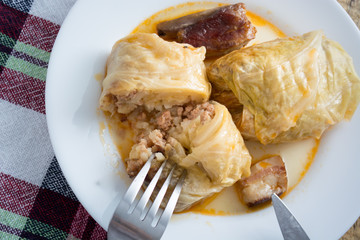 Serbian dish sarma served in white plate