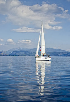 Sun Rays/Race in the calm during the regatta in the  mediterranean