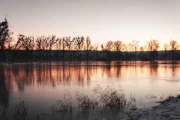 Winter lake at sunset