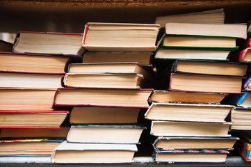 Old books on book shelf background